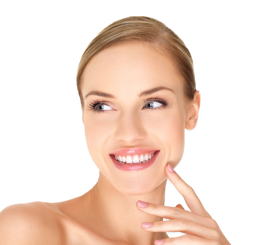 Woman with clear skin and a bright smile touching her cheek